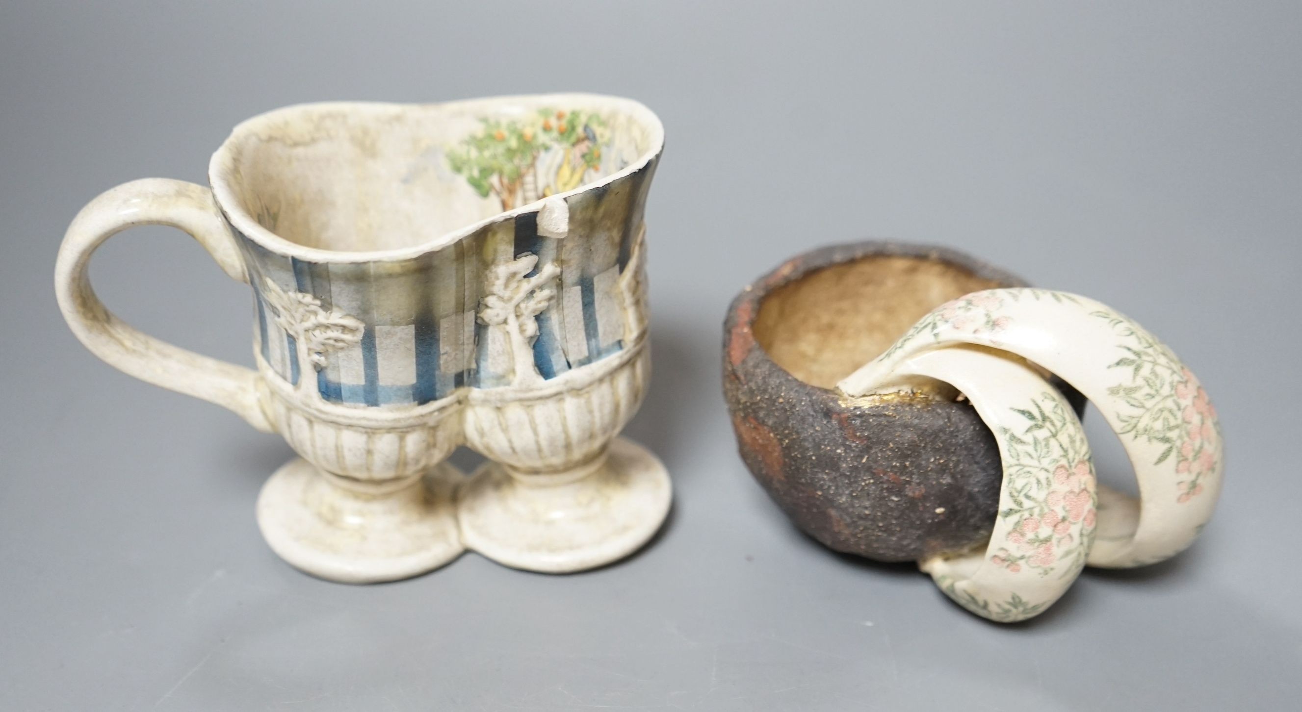 Carol McNicoll (b.1943), ‘Many a slip’ cup and another cup, with purchase receipt from Marsden Woo Gallery, 3 September 2015, tallest 10cm, (2)